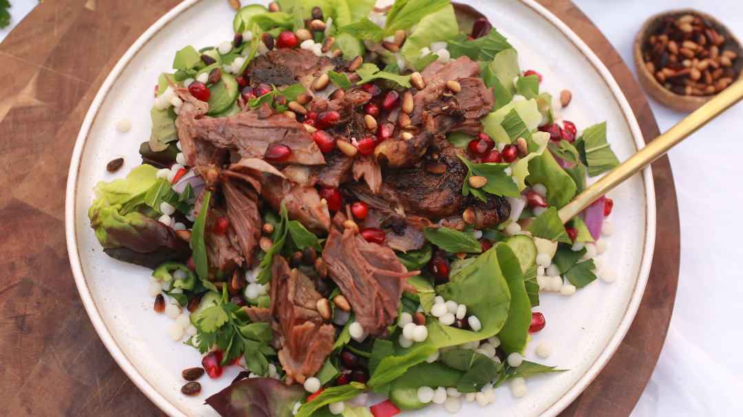 Slow Cooked Lamb with Pomegranate Cous Cous